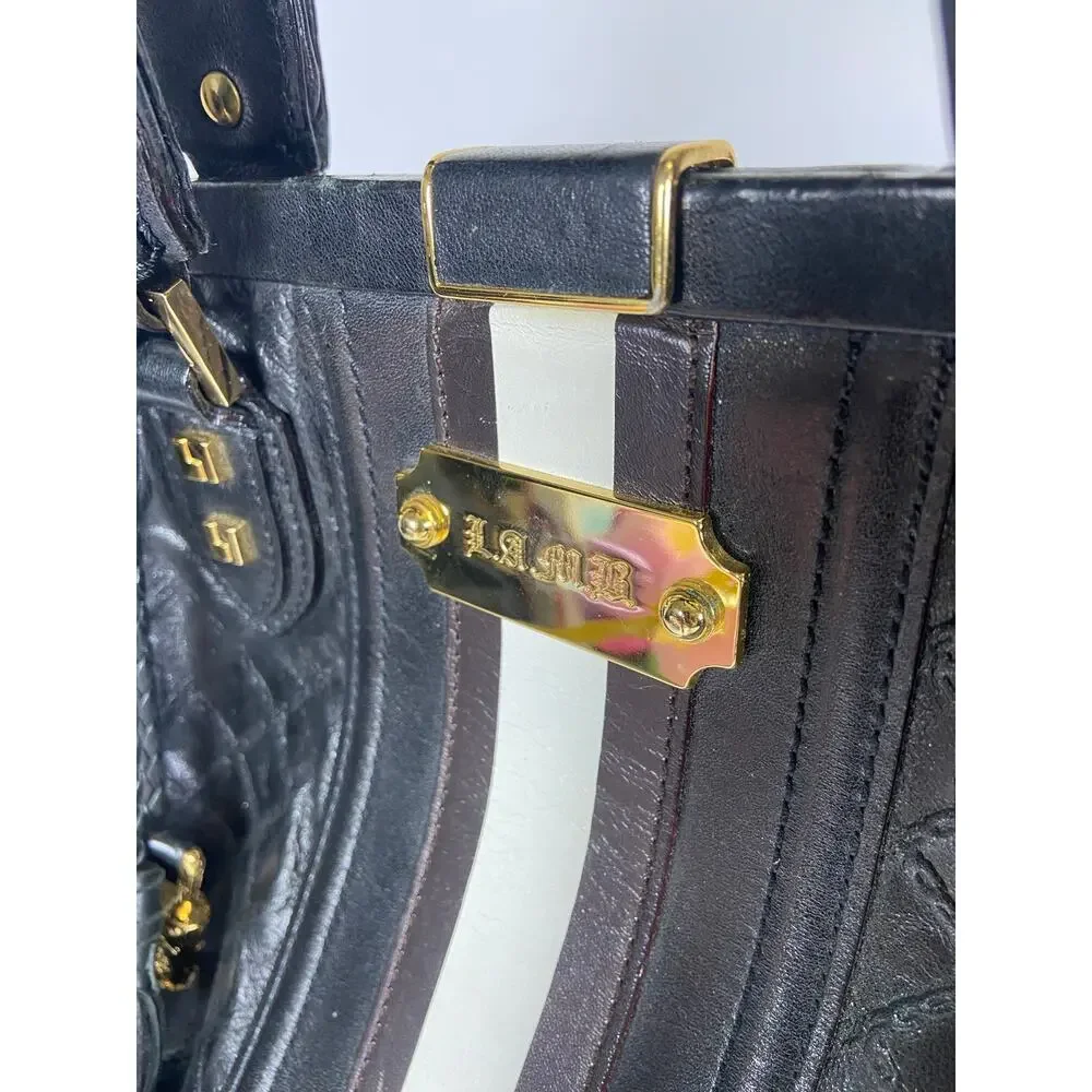 L.A.M.B by Gwen Stefani rocksteady leather